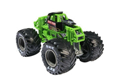 Monster Jam Grave Digger 1:64 tires close-up highlights realistic tread and grip-ready design.
