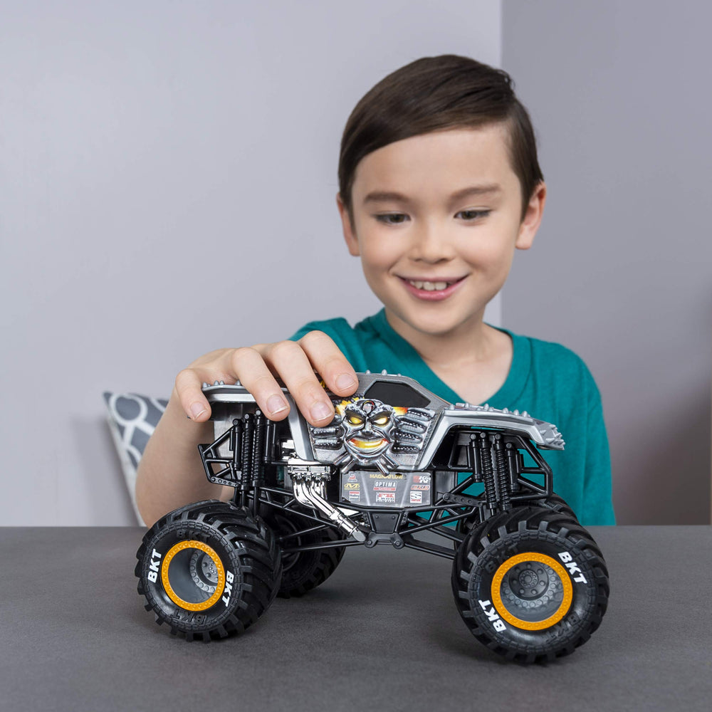 Monster Jam Max D rear view highlights working suspension-inspired detailing.