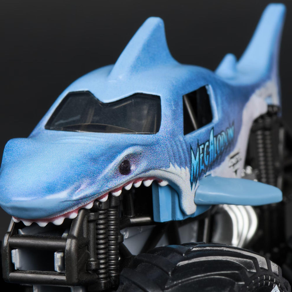 Monster Jam Megalodon 1:64 tire graphics authenticate the toy design.