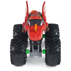 Monster Jam 1:64 die-cast truck graphics detail highlights bold branding and realistic patterns.