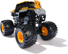 Monster Jam truck with BKT tires for improved traction on smooth surfaces.