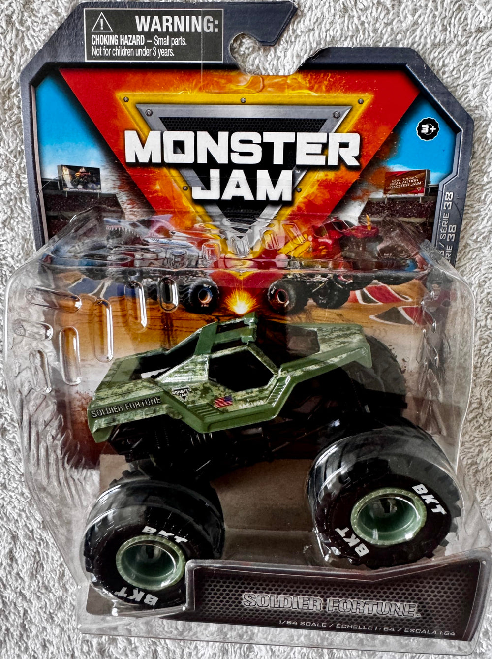 Monster Jam Soldier Fortune truck side view highlights precise paint and authentic logo details.