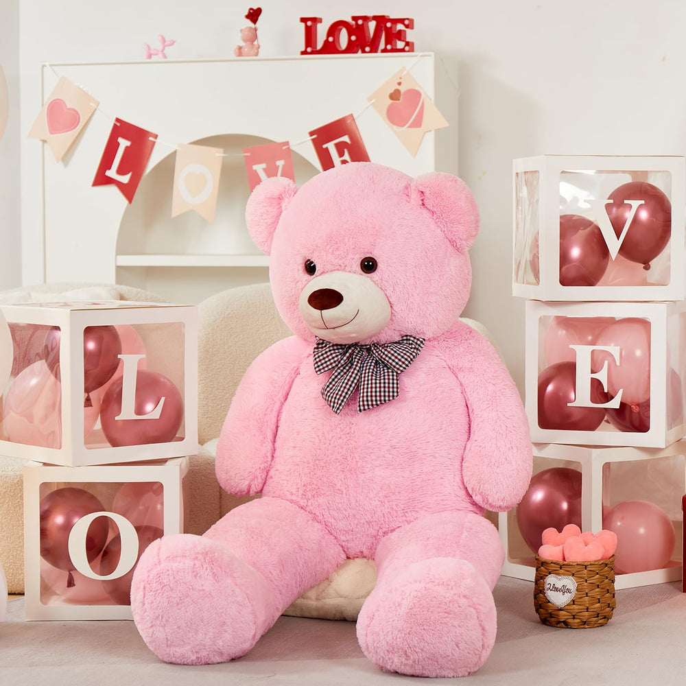 MorisMos pink giant teddy bear close-up of butter-soft fur, inviting hugs.