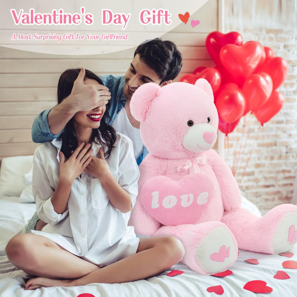 MorisMos teddy bear displayed in a bedroom as a romantic centerpiece.