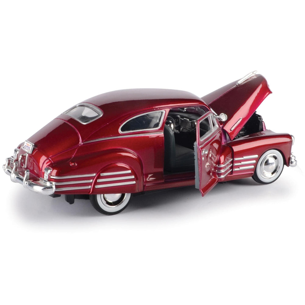 Motormax 1948 Chevy Aerosedan Fleetline side view captures proportions for shelf display