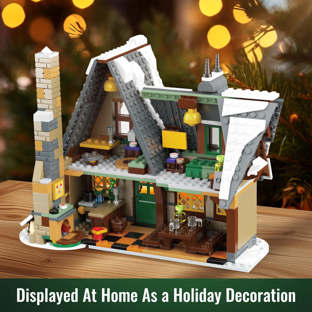 Mould King 16049 Christmas Cottage with chimney and windows for festive display.