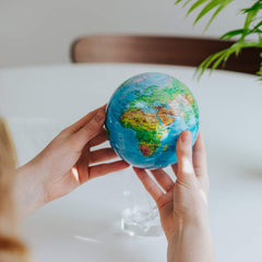 MOVA Globe combines modern decor with geography learning in offices.