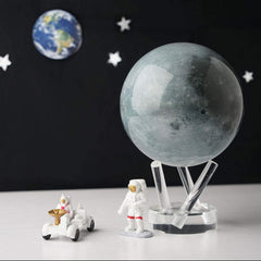 MOVA Moon Globe 6-inch ambient-light motion showcases quiet office rotation.
