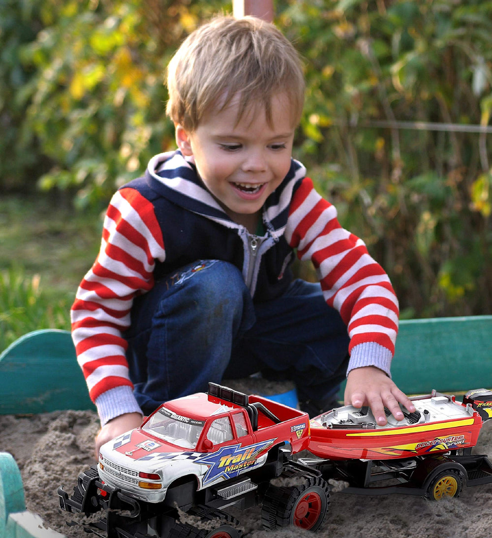 Mozlly trailer with speed boat detaches for versatile play scenarios.