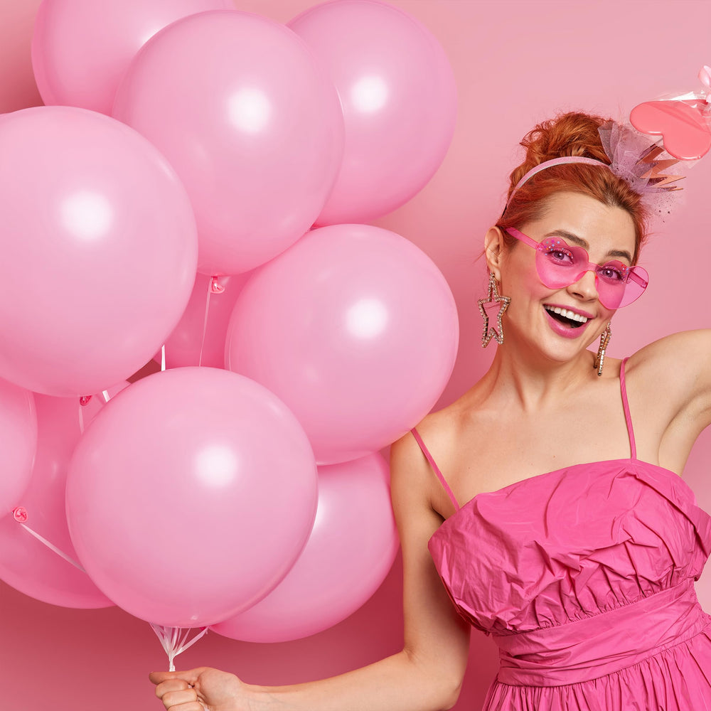 Mr. Pen pink balloons arranged for Valentine decor and photos.