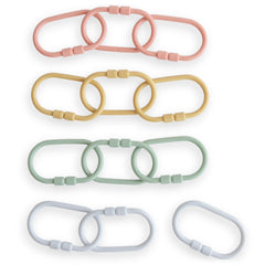 Mushie Chain Link Rings attach toys to strollers for easy reach during playtime.