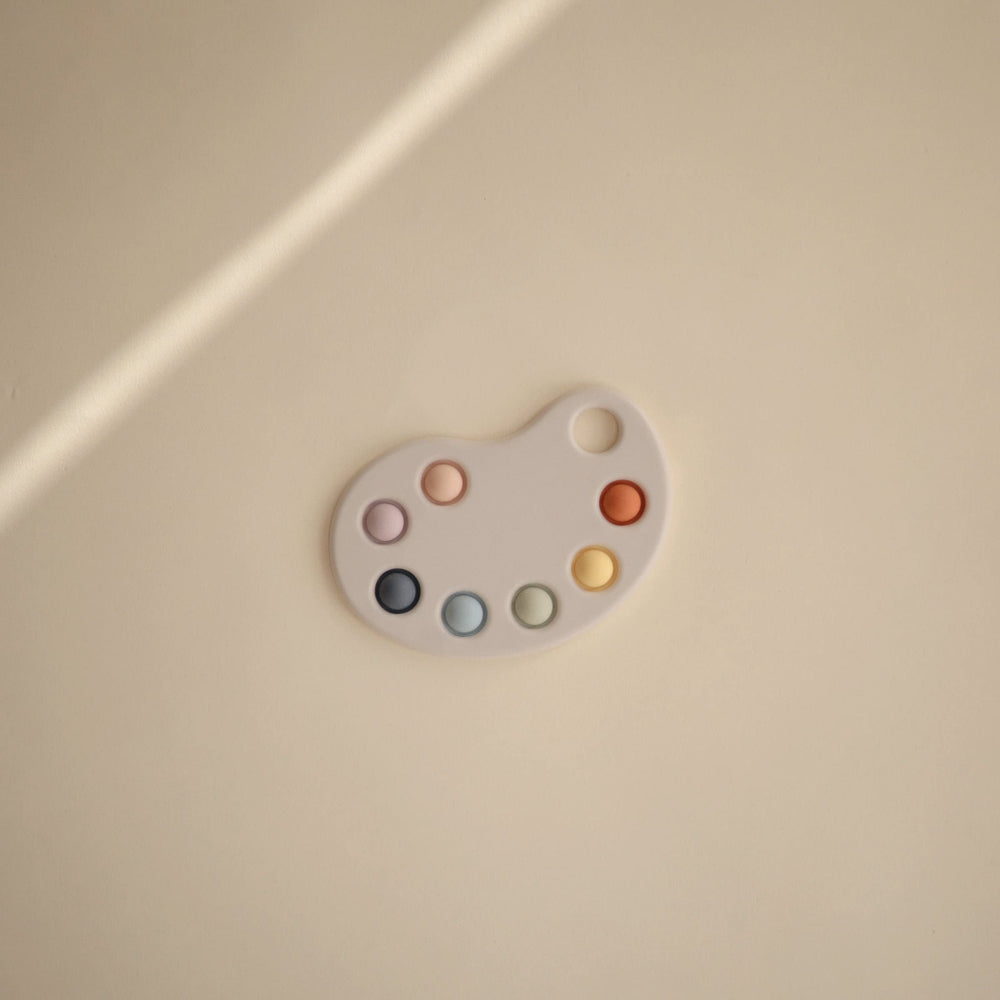 Mushie Paint Palette Press Toy bubbles close-up highlights gentle pop for focus