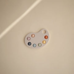 Mushie Paint Palette Press Toy bubbles close-up highlights gentle pop for focus