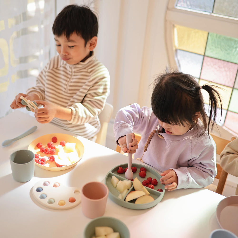 Mushie Paint Palette Press Toy soft colors promote calm, engaging arts-and-crafts play