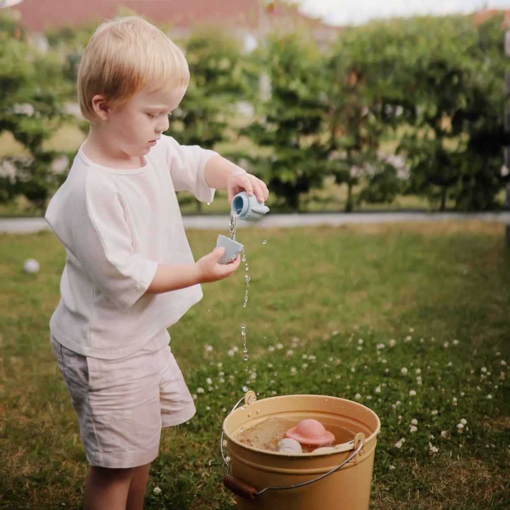 Mushie Space Bath Toy two-piece design enables thorough cleaning.