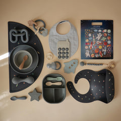 Mushie Space sticker set is travel-friendly for quiet car rides.