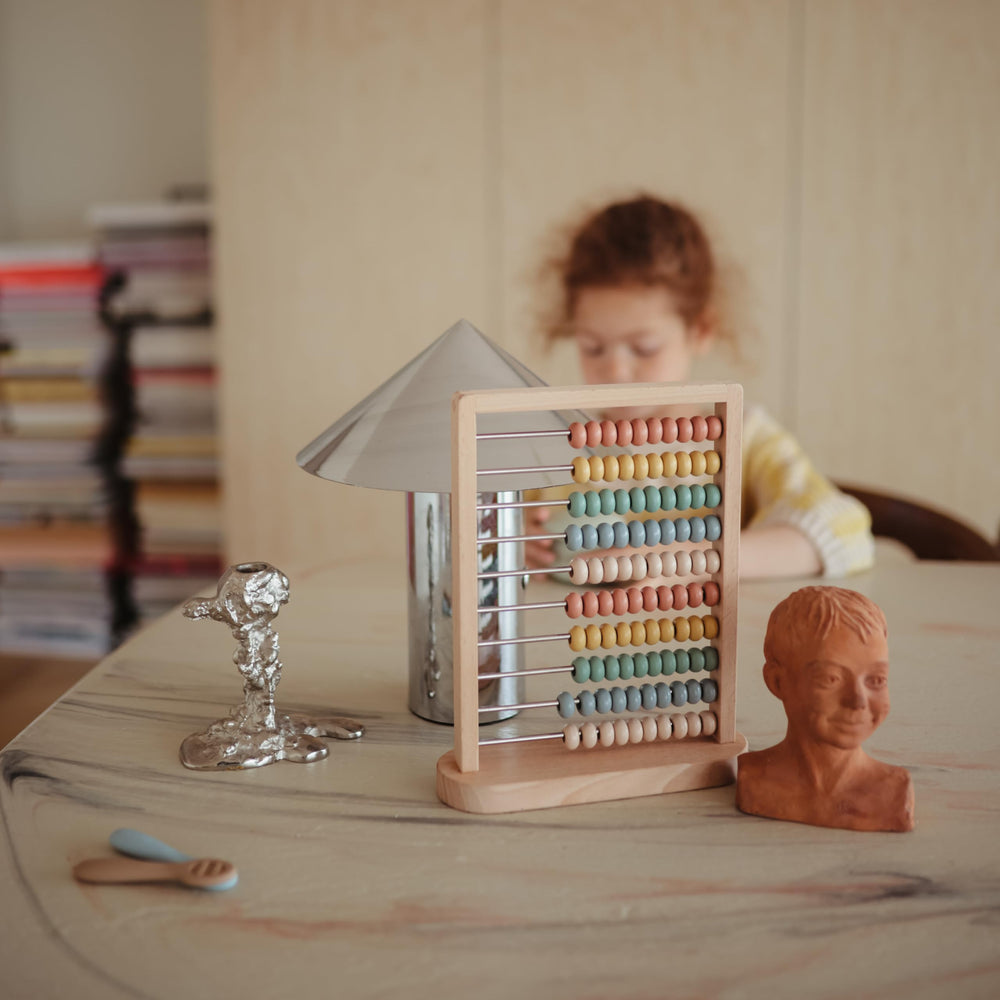 Mushie wooden abacus designed for kids 2 years and up for interactive learning