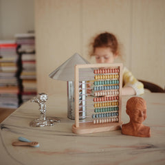Mushie wooden abacus designed for kids 2 years and up for interactive learning