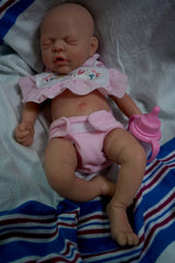 MYREBABY doll wearing a complete clothes set for realistic play.