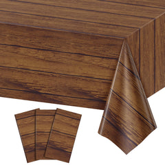 NatNarr wood grain tablecloth on dining table protects surface and decor.