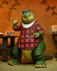 NECA Earl Sinclair with captain's hat adds character to vintage family-dinosaur scenes.