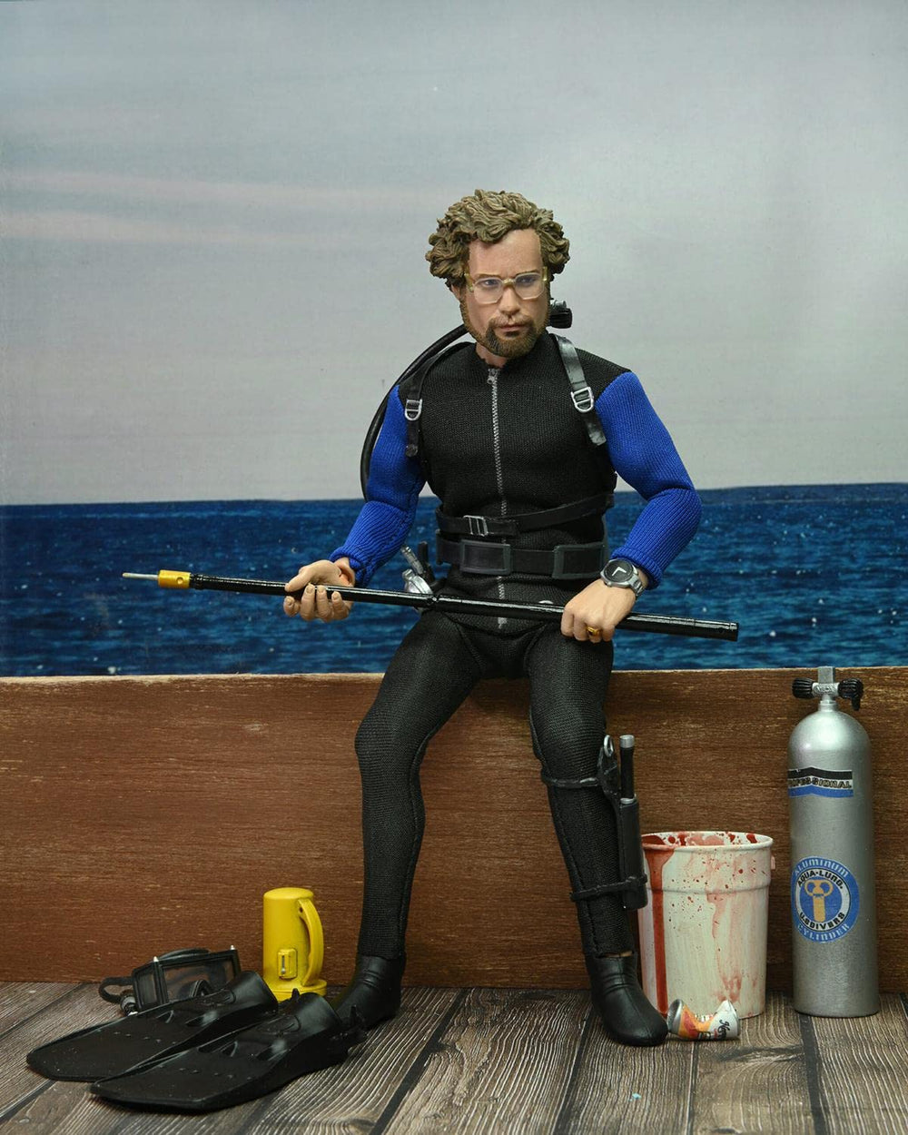 NECA Jaws Hooper swappable heads enable expression changes in dioramas.