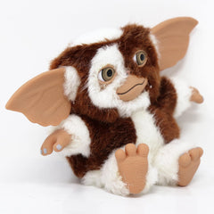NECA Similing Gizmo plush; side view, compact size suitable for desks and shelves.