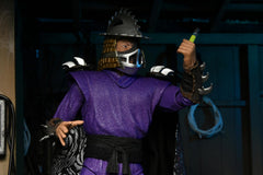 NECA TMNT Shredder back view highlighting silhouette and packaging.
