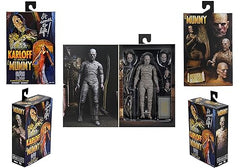 NECA Mummy interchangeable heads for varied expressions on display