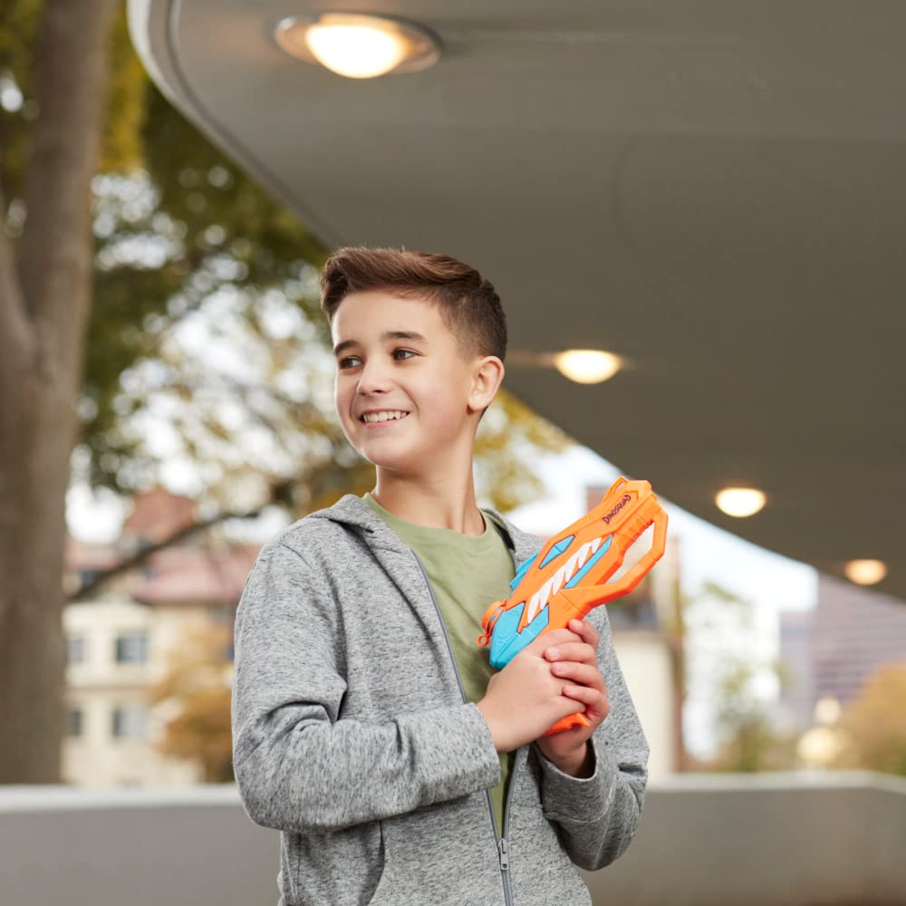 Nerf Dinosquad Raptor-Surge in-action gameplay outdoors under sunny skies.