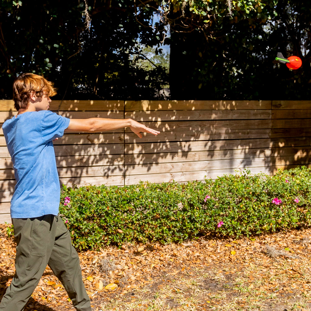 NERF Vortex Aero Howler ball enabling long-distance passes in yard play