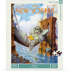 New York Puzzle Company New Yorker Liberty pieces close-up showing random-cut challenge for adults.