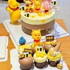 Newmemo Gold-confetti-balloon-topper adds festive sparkle to desserts.