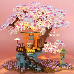 NEWRICE Sakura Tree House Lights LED illumination showing cozy nighttime glow.