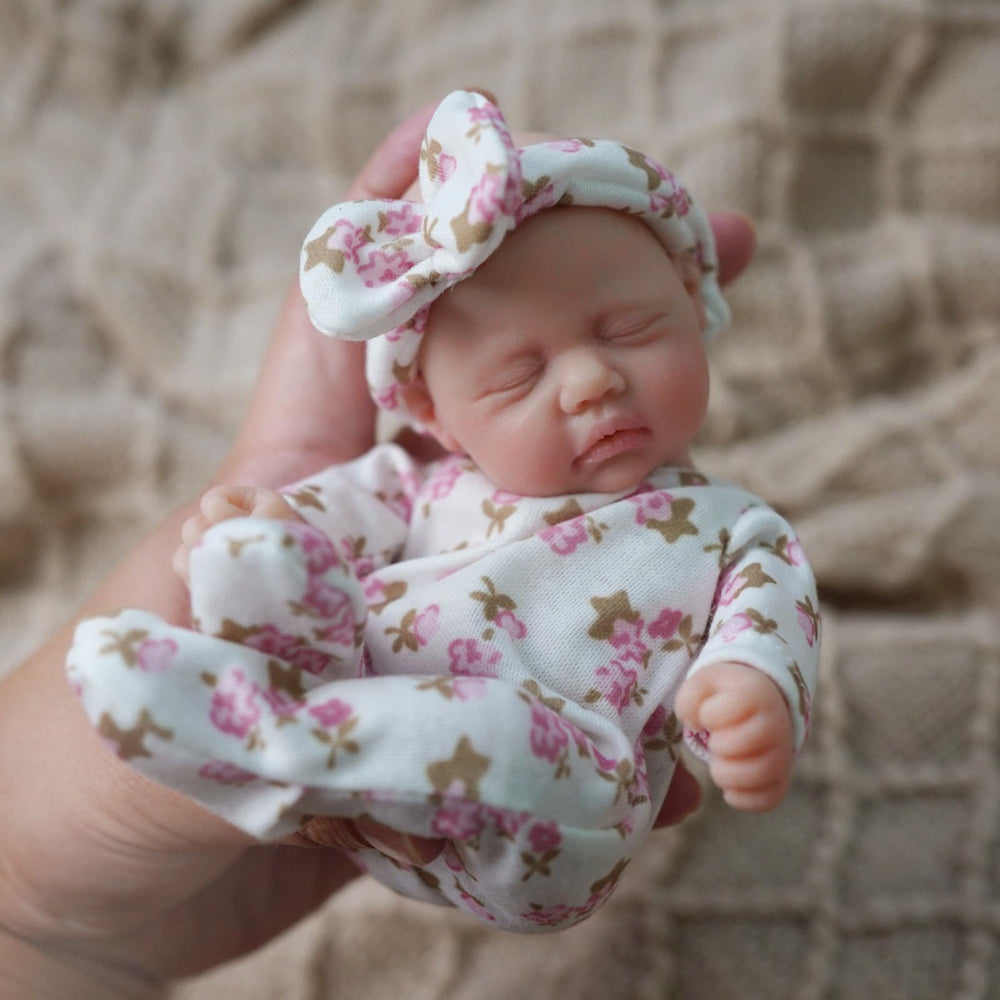 Newtotlove 7 inch preemie body highlights palm size portability for on the go play