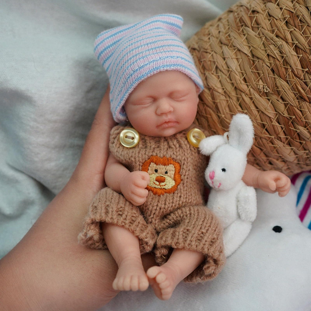 Newtotlove doll comes with bottle and pacifier for realistic care-time play.