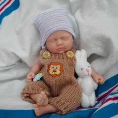 Newtotlove gift box contents with doll and accessories for a complete keepsake experience.
