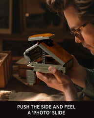 Nifeliz Plexoid BX-70 loading film pack emphasizes tactile assembly.