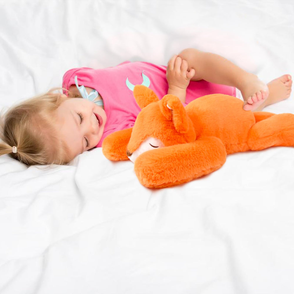 Niuniu Daddy fox weighted plush in lap use for calm focus.