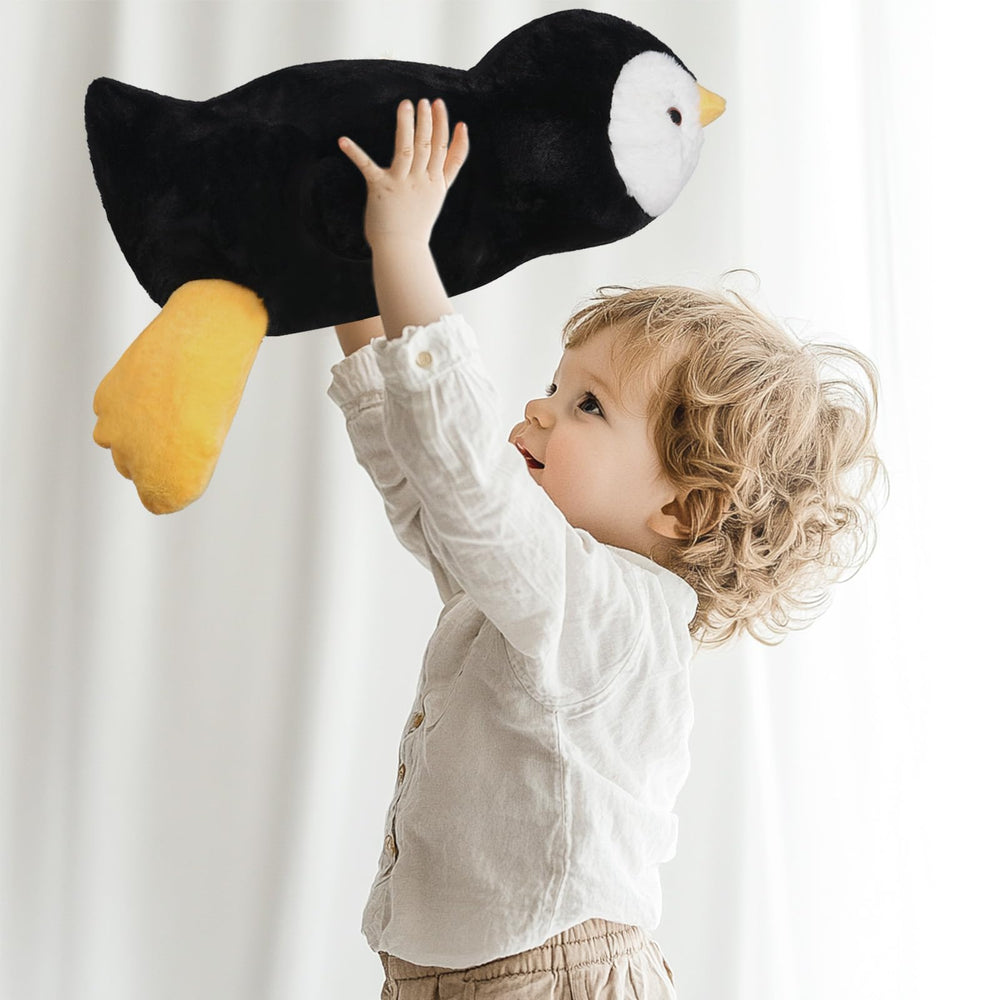 Niuniu Daddy penguin fluffy fur closeup highlights soft touch for cuddling.