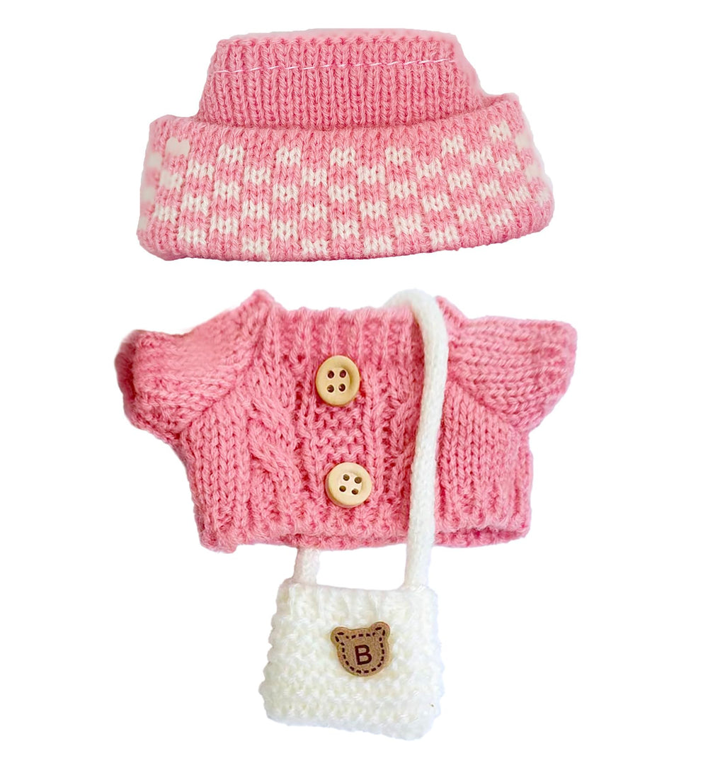 NiXiSHEEN fold-over hat detail complements the doll’s look with a refined silhouette.