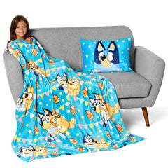 Northwest Bluey Party Pups folded blanket with pillow accent for sleepovers