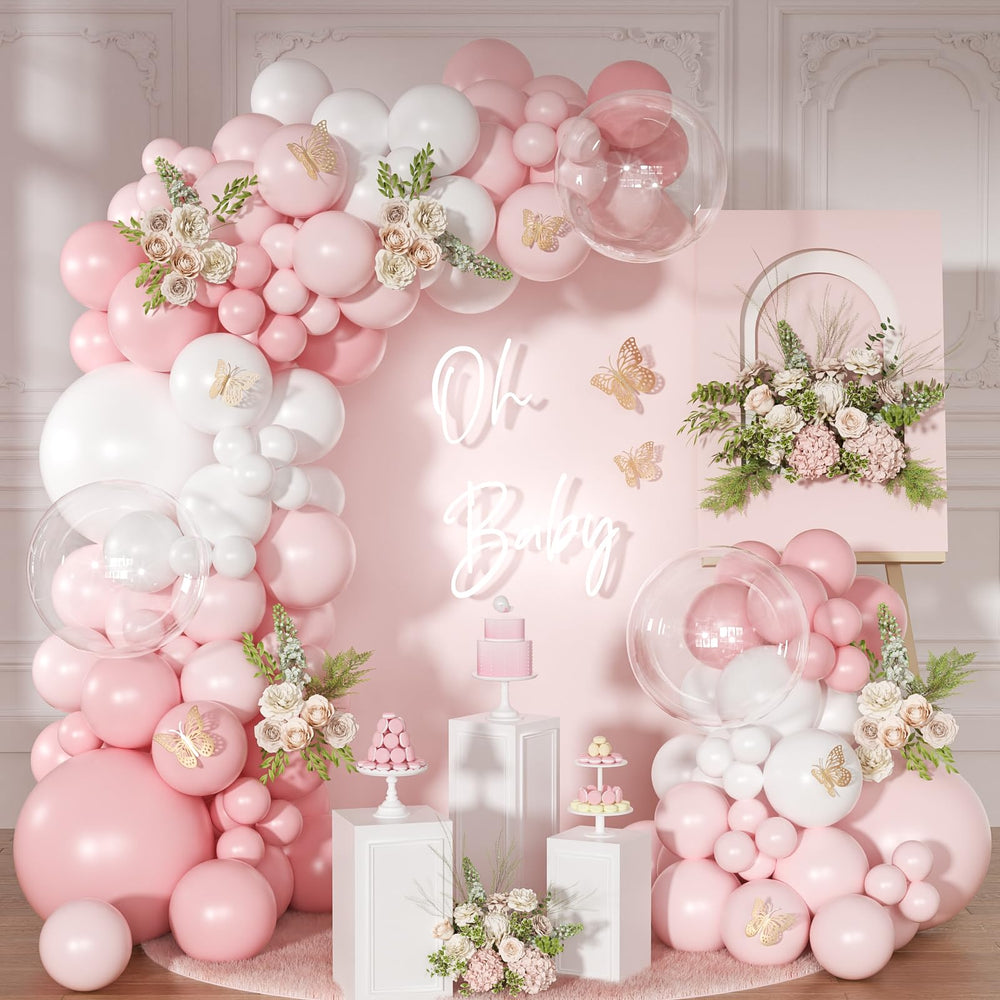 NUTTYBASH light pink arch kit being assembled for a chic backdrop.
