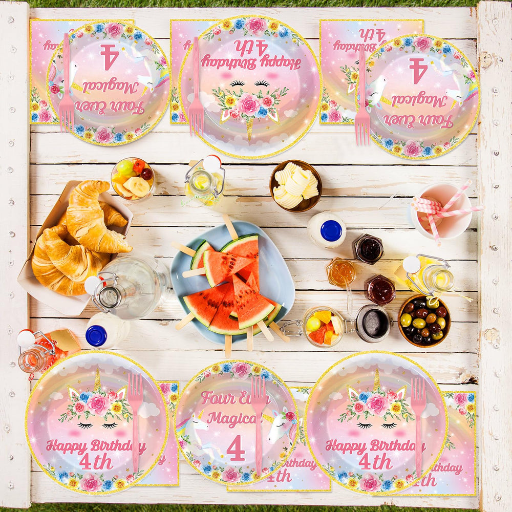 Oitnlaughter unicorn table setup shows coordinated rainbow decor for a bright celebration