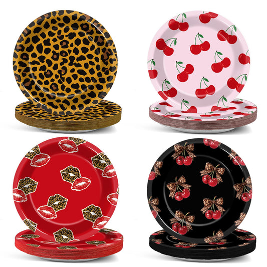 OjustBeOk leopard cherry plates close-up with bold red and black pattern, festive dining.