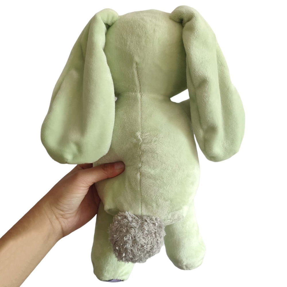 Okidg Knuffle Bunny plush on shelf, soft stuffed animal ideal for gifting.