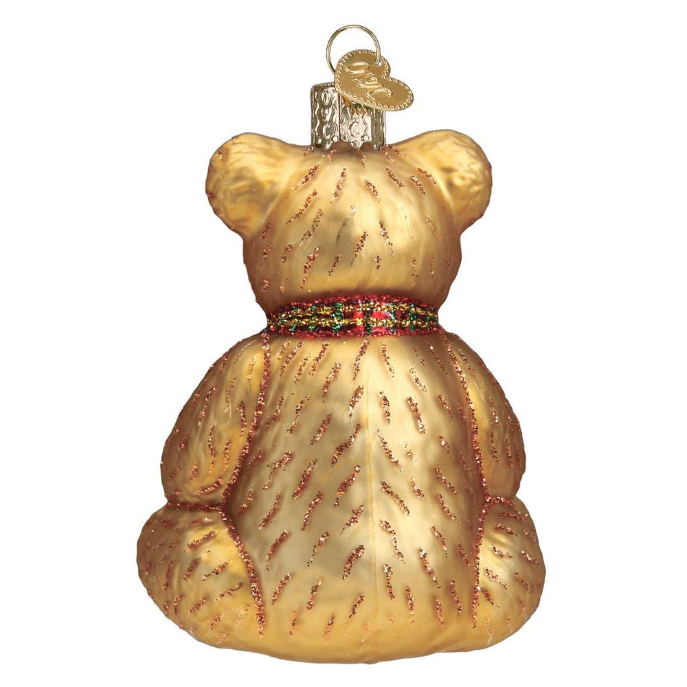Old World Christmas Teddy Bear ornament glittered accents catch light for festive sparkle.