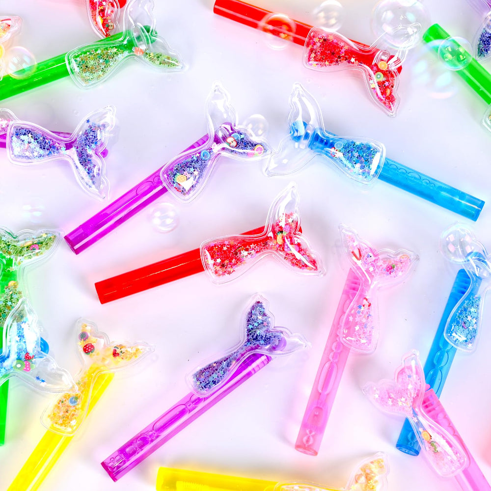 ONBKYGF Goodie bags with mermaid bubble wands enhance party favors.