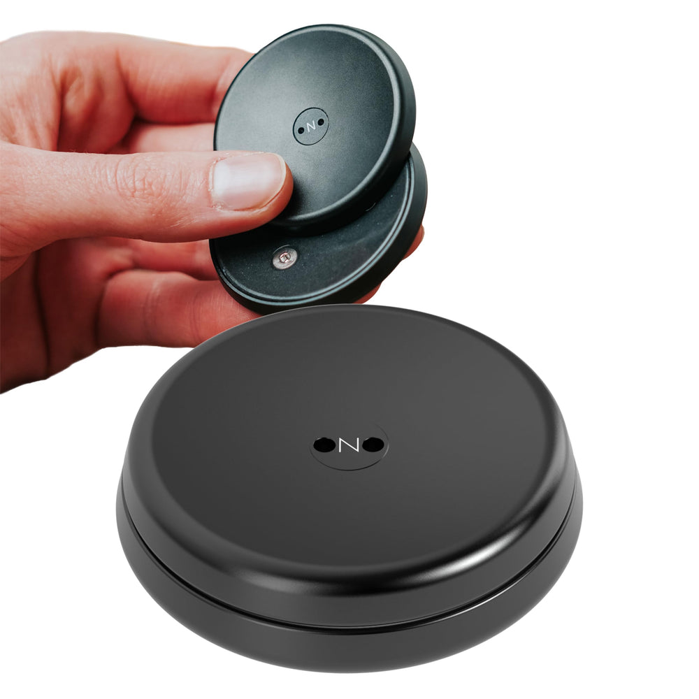 ONO Slider handheld fidget toy in black aluminum for quiet focus.
