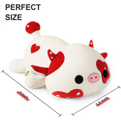 Onsoyours cow plush on sofa as cozy decor.